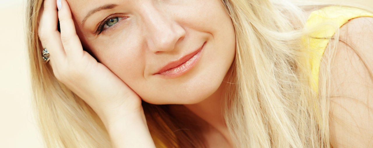 Natural looking lightest blond highlights on dark blond hair.