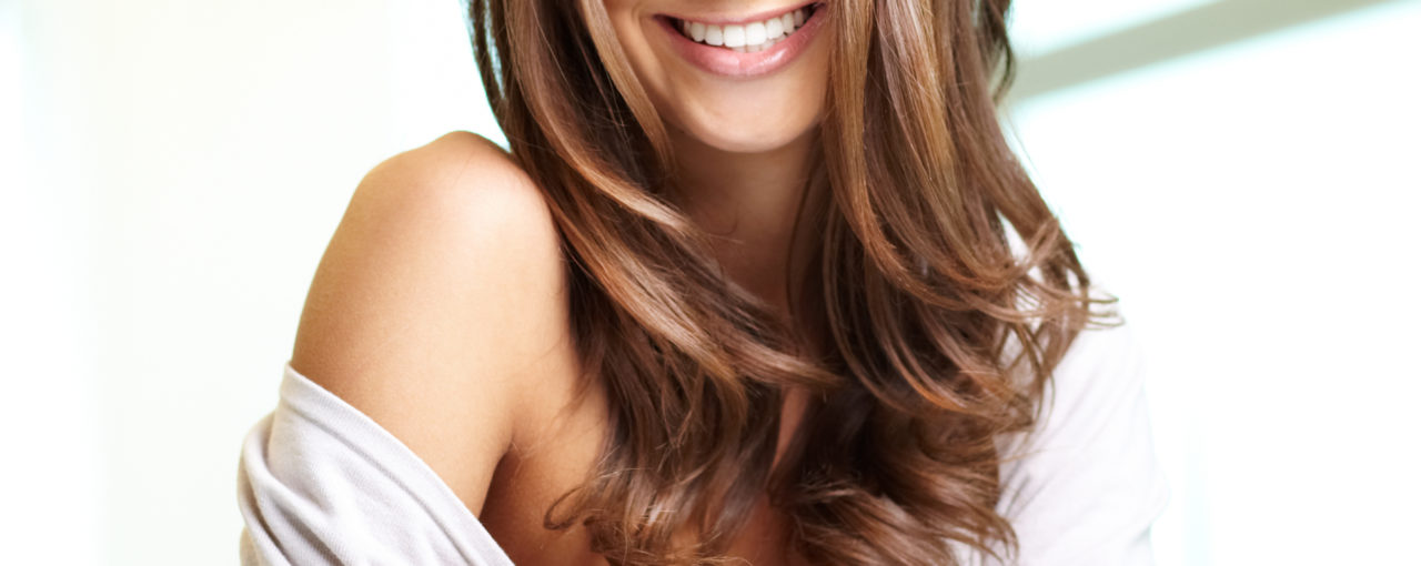 Long framing layers light brunette hair color done with beach waves