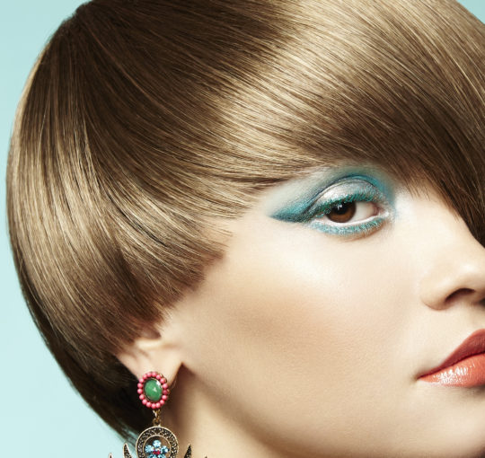 Best retro 1960s era Vidal Sassoon haircut in darkest solid blond or a very light brunette .